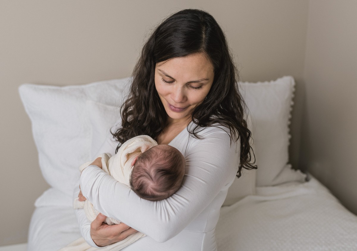 Glenda holding her baby